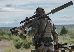 Image result for A 50 Cal Sniper Next to Person