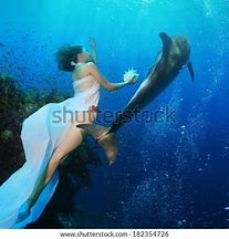 Image result for Mermaid Holding Shell