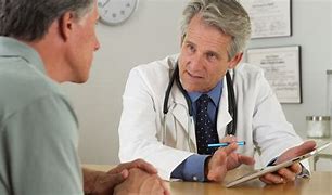 Image result for Photo of Doctor Seeing Patient