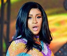 Image result for Cardi B Costume Rips On Stage