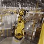 Image result for Industrial Warehouse with Robotic Machinery