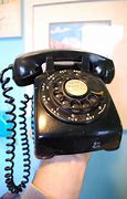 Image result for 1960s Rotary Phone in a Bag
