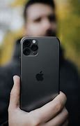 Image result for iPhone 11 Pro in Black Hand