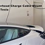 Image result for Retractable Tesla Charging Cable