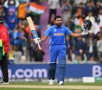 Image result for Rohit with the World Cup