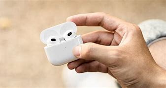 Image result for Picture of Person Holding Air Pods