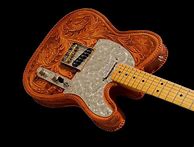 Image result for Waylon Jennings Leather Guitar