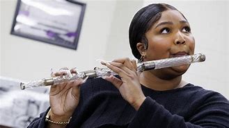 Image result for Lizzo Twerking Flute