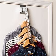 Image result for Clothes Pull Down Rack for Inside a Cabinet