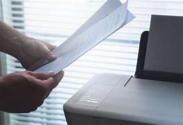 Image result for Person Holding a Handheld Label Printer