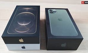 Image result for iPhone 12 Pro Max Box Holding Phone