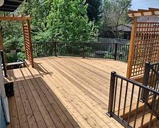 Image result for Cedar Deck with Black Pants in the Background