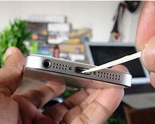 Image result for Needle in iPhone Charging Port