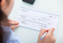Image result for Signing Checks