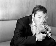 Image result for Andrew Tate Cigar