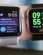 Image result for Apple's Watches and Fitbit Versa Face