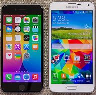 Image result for Galaxy S5 vs iPhone 5S