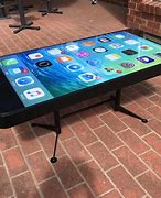 Image result for Ihpone On a Table