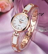 Image result for Guess Woman's Rose Gold Watch