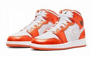 Image result for Orange and White Jordan's