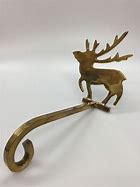 Image result for Reindeer Stocking Holders for Mantle