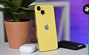 Image result for iPhone 14 Yellow in Hand Unboxing