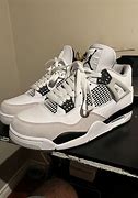 Image result for Jordan 4S Game Changers Reps