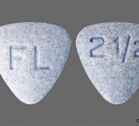 Image result for Blue Triangle Shaped Pill