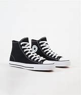 Image result for Black and White Canvas Shoes