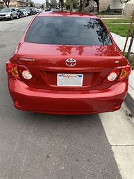 Image result for 2010 Toyota Corolla Le Black
