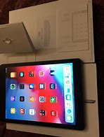 Image result for Apple iPad 5th Gen Silver