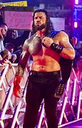 Image result for Roman Reigns Biceps