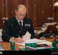 Image result for President Putin at Desk