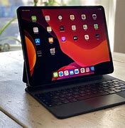 Image result for Applewhite Magic Keyboard and Space Gray iPad