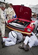 Image result for mechanics working on mustang GTs