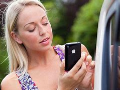 Image result for Person On iPhone Stock Image