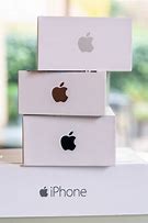 Image result for Apple Computer and iPhone On Boxes