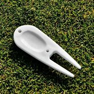 Image result for Divot Repair Tool Golf Professional