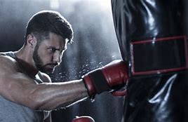 Image result for Man Punching Bag Boxing