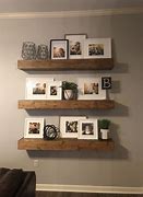 Image result for Stone Wall in Living Room with Floating Shelves
