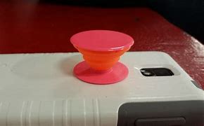 Image result for Phone with a Popsocket On It