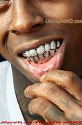Image result for Lil Wayne Lip Tattoo