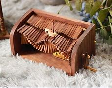 Image result for Try to Remember Skunk Wooden Music Box