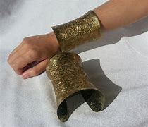 Image result for Gold Armor Bracers