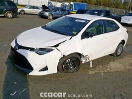 Image result for A Crashed Toyota Corolla 2019
