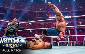 Image result for WrestleMania XXVII John Cena Green Arm Pads