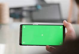 Image result for Man Looking at Phone Greenscreen