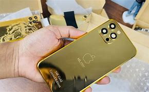 Image result for iPhone 14 Pro Gold Unboxing