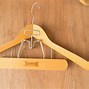 Image result for Angled Wooden Coat Hangers