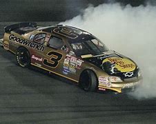 Image result for Picture of a Gold NASCAR Chevy